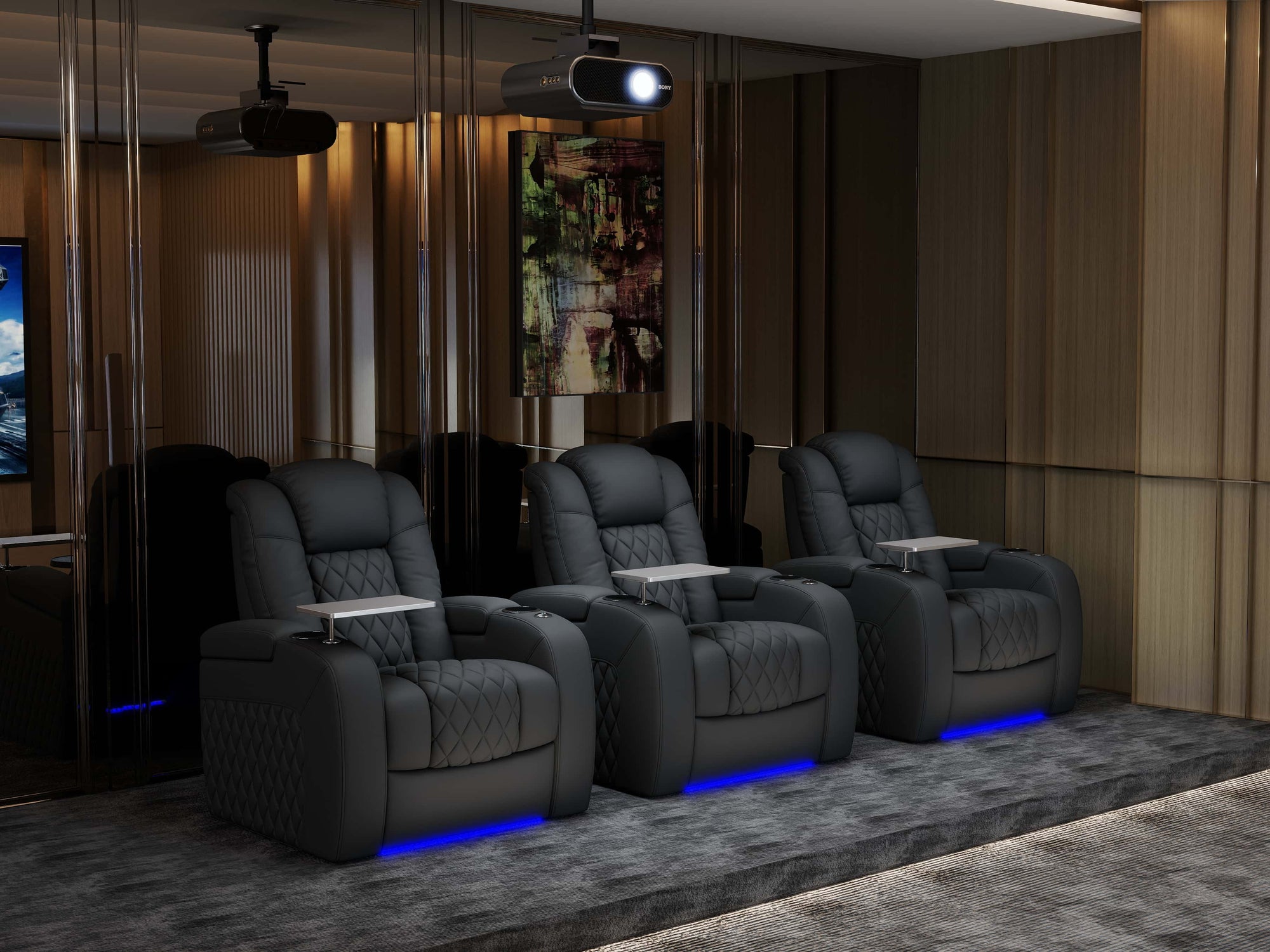 Row of premium home theater recliner seats with tray tables and blue LED base lighting in a modern cinema room