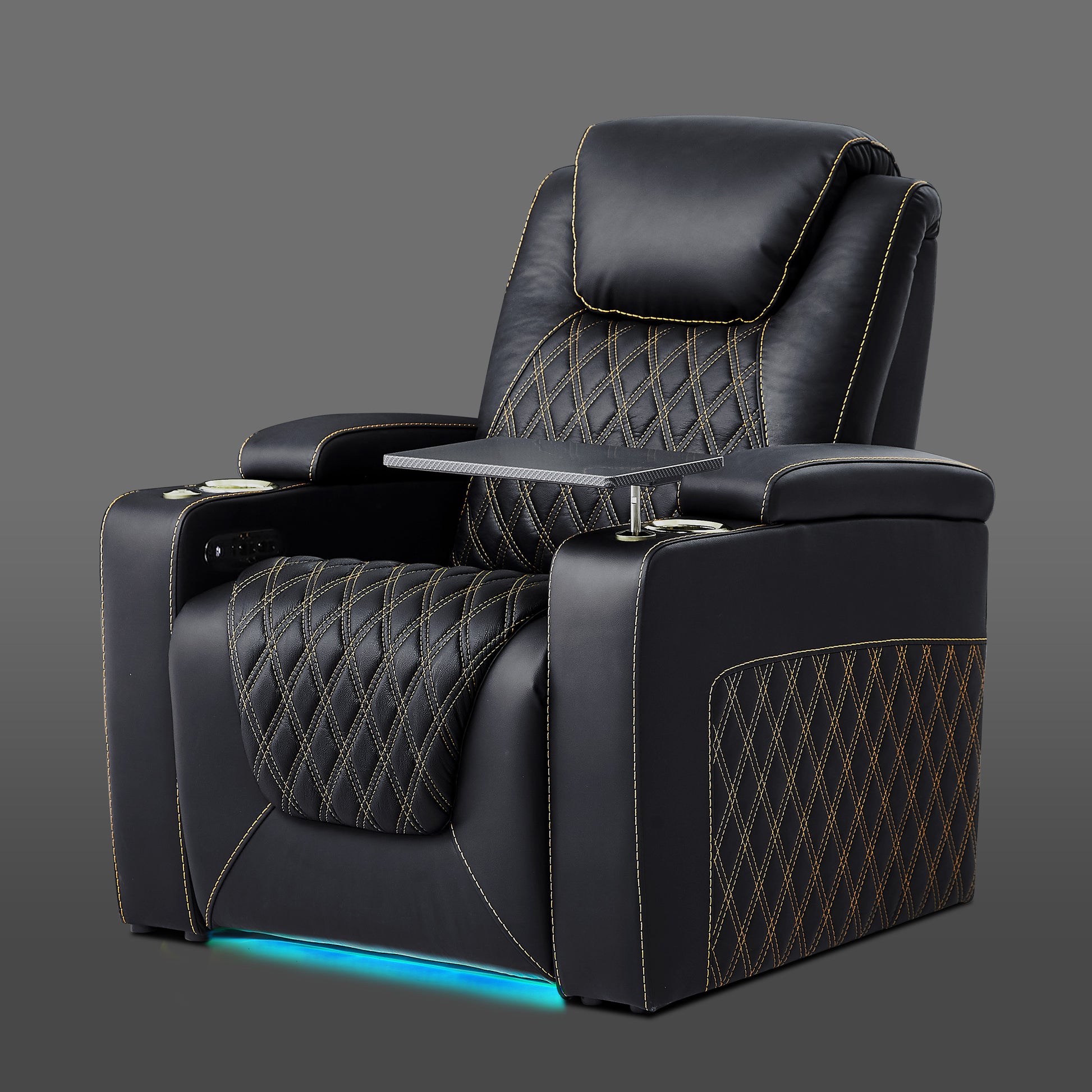 Black single cinema chair with quilted cushions and gold contrast stitching