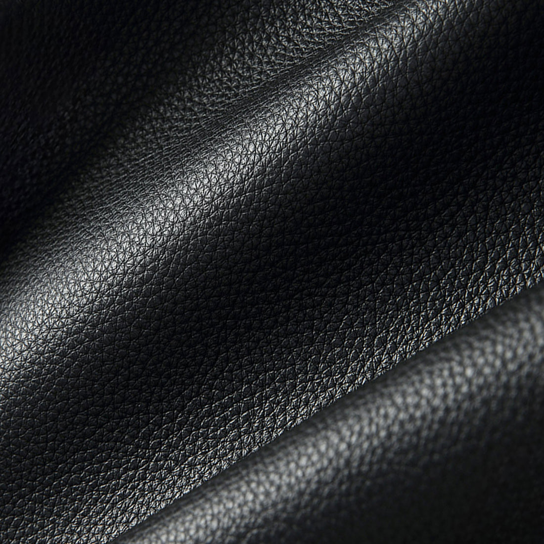 Power recliner with top grain leather