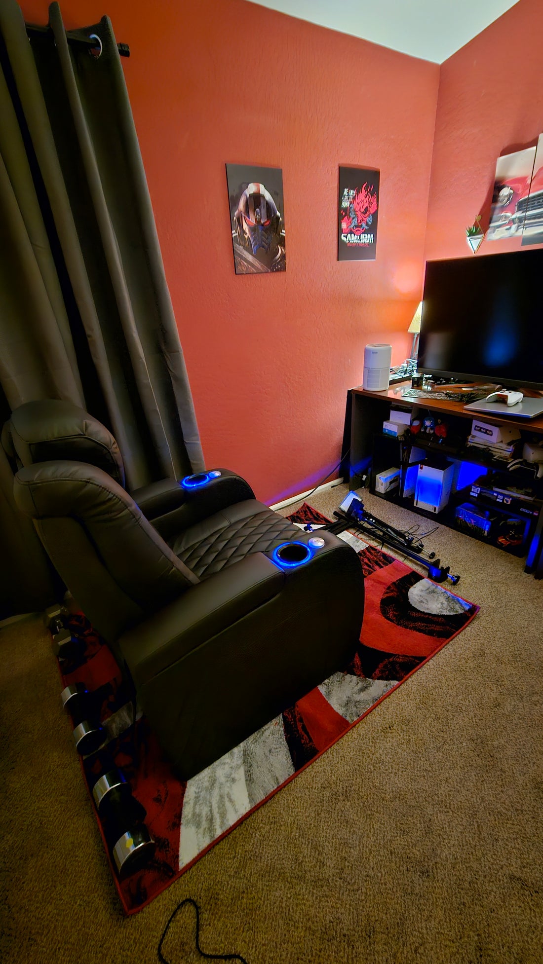 Comfortable seating placed in a compact gaming nook