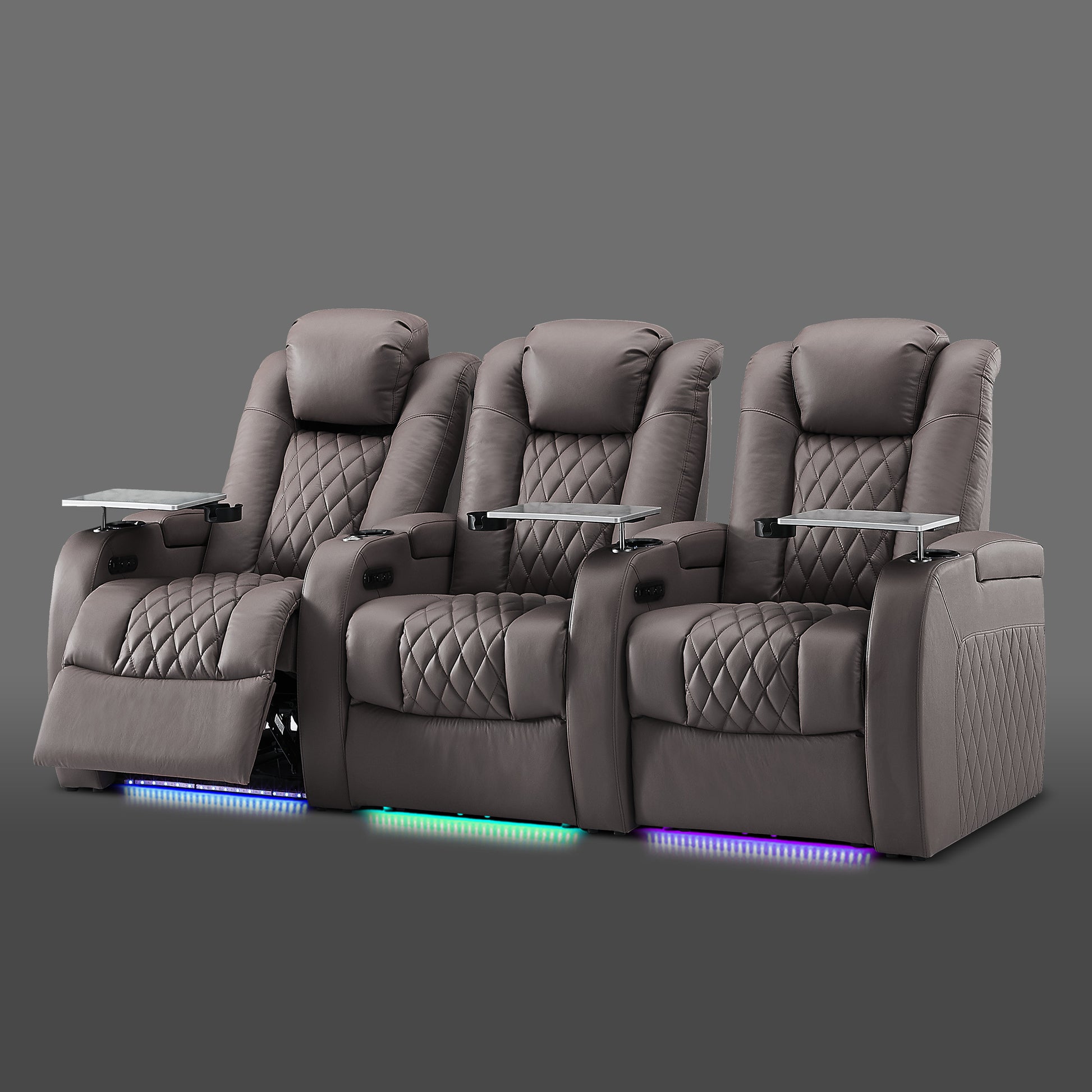 Gray theater seating in a three seat layout with zero gravity