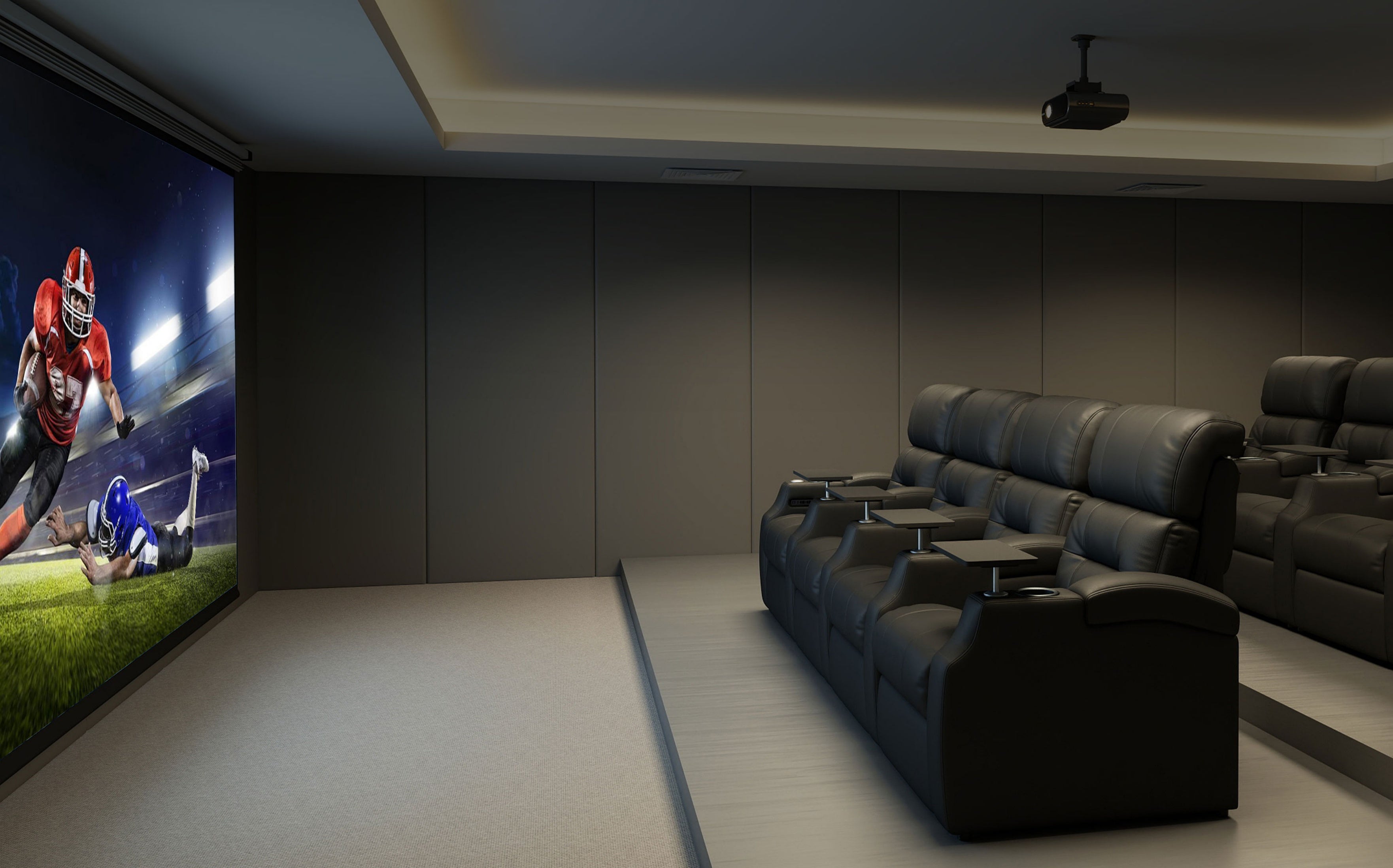 Home theater setup with multiple recliners during a live sports game