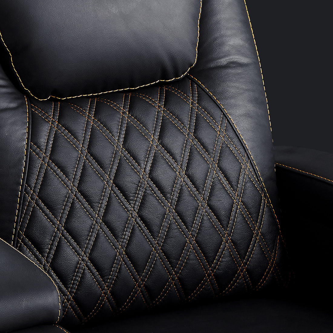 Close up of black top grain leather upholstery with diamond stitching detail