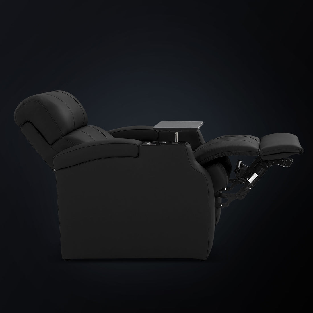 Side view of a black power recliner with extended footrest and backrest, highlighting smooth and quiet reclining functionality.