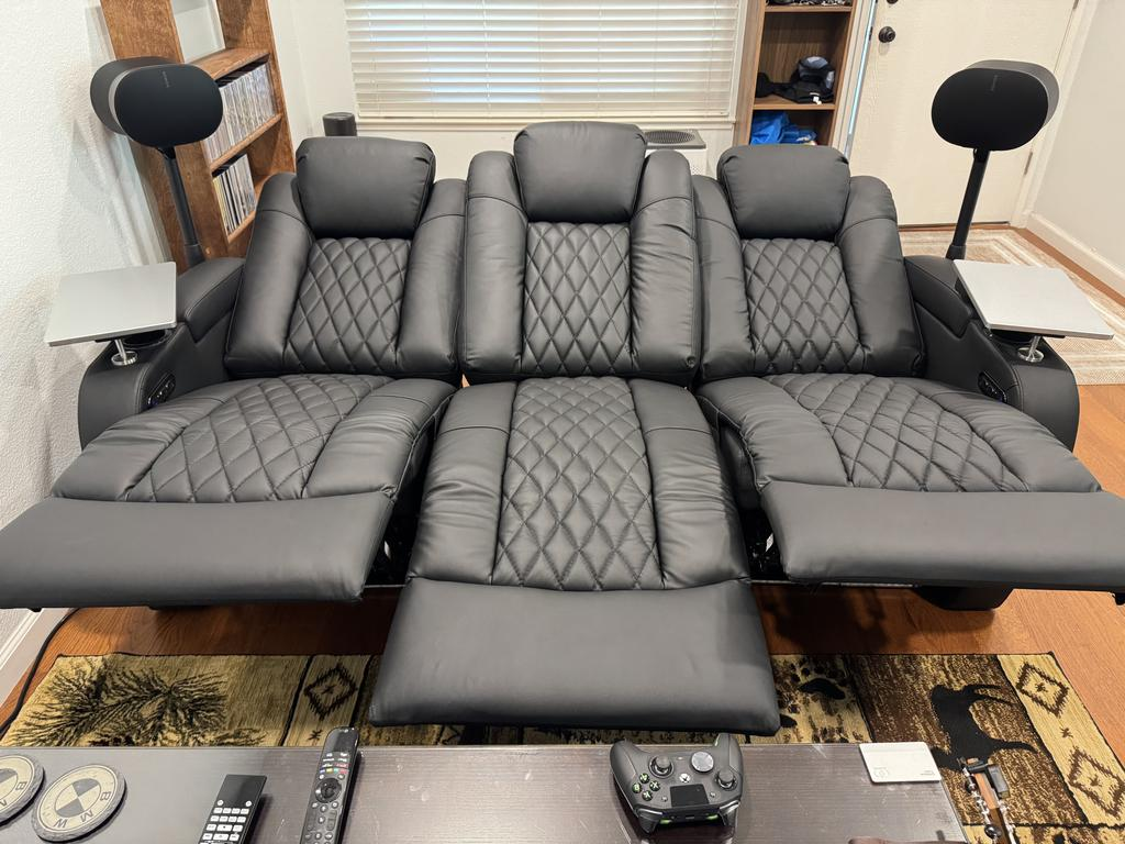 Multi-seat sofa arranged for shared family gaming