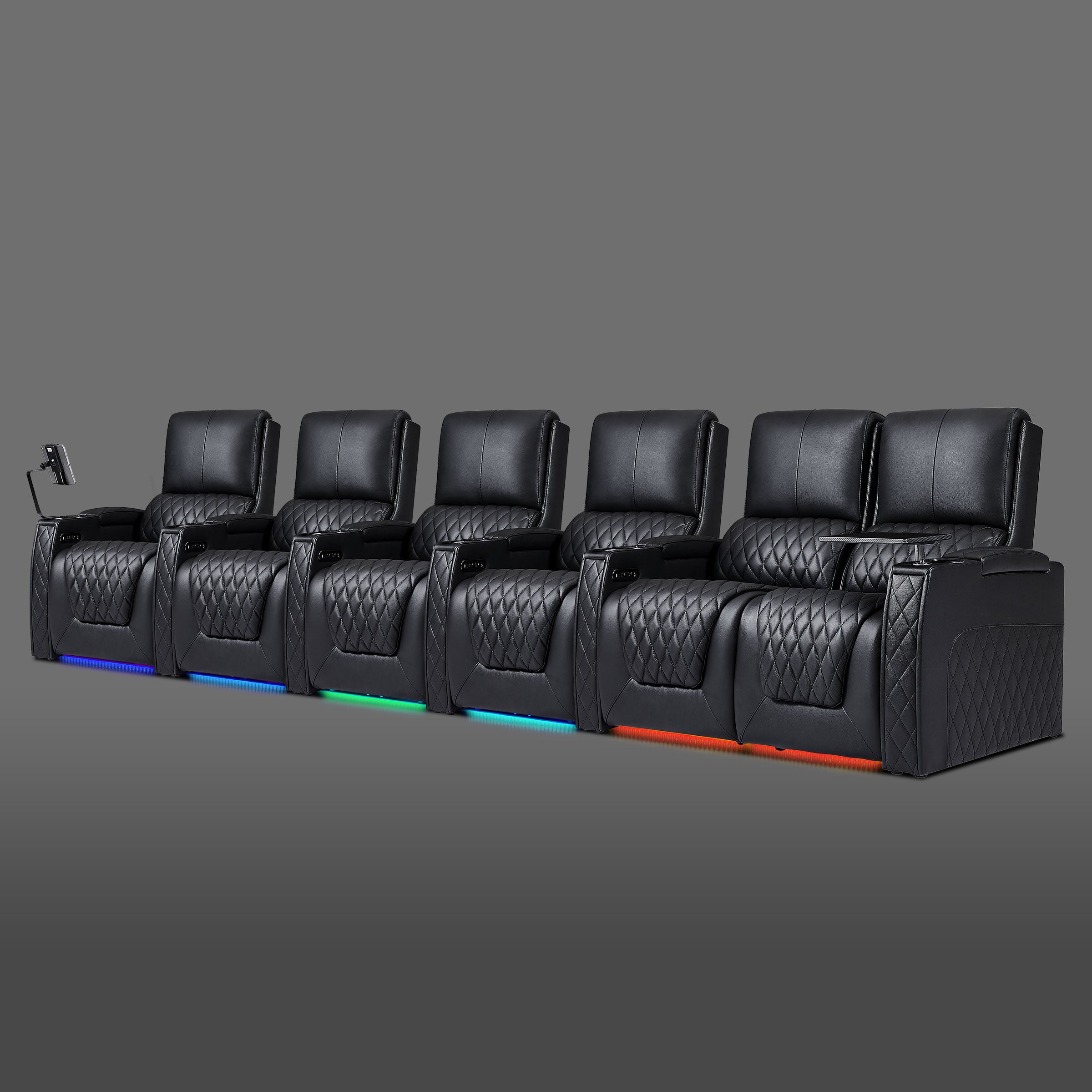Black six seat modular theater seating with paired recliners on the left and four single chairs